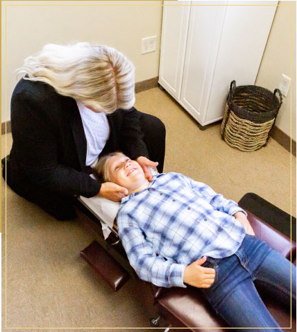 Modern chiropractic techniques on a child
